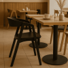 Super-Seat | Scandinavian dining chairs black wood wooden tables, black chairs, neutral tones, pampas grass in vase. | Hospitality Furniture