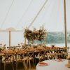 Natural wood cross-back stacking chairs