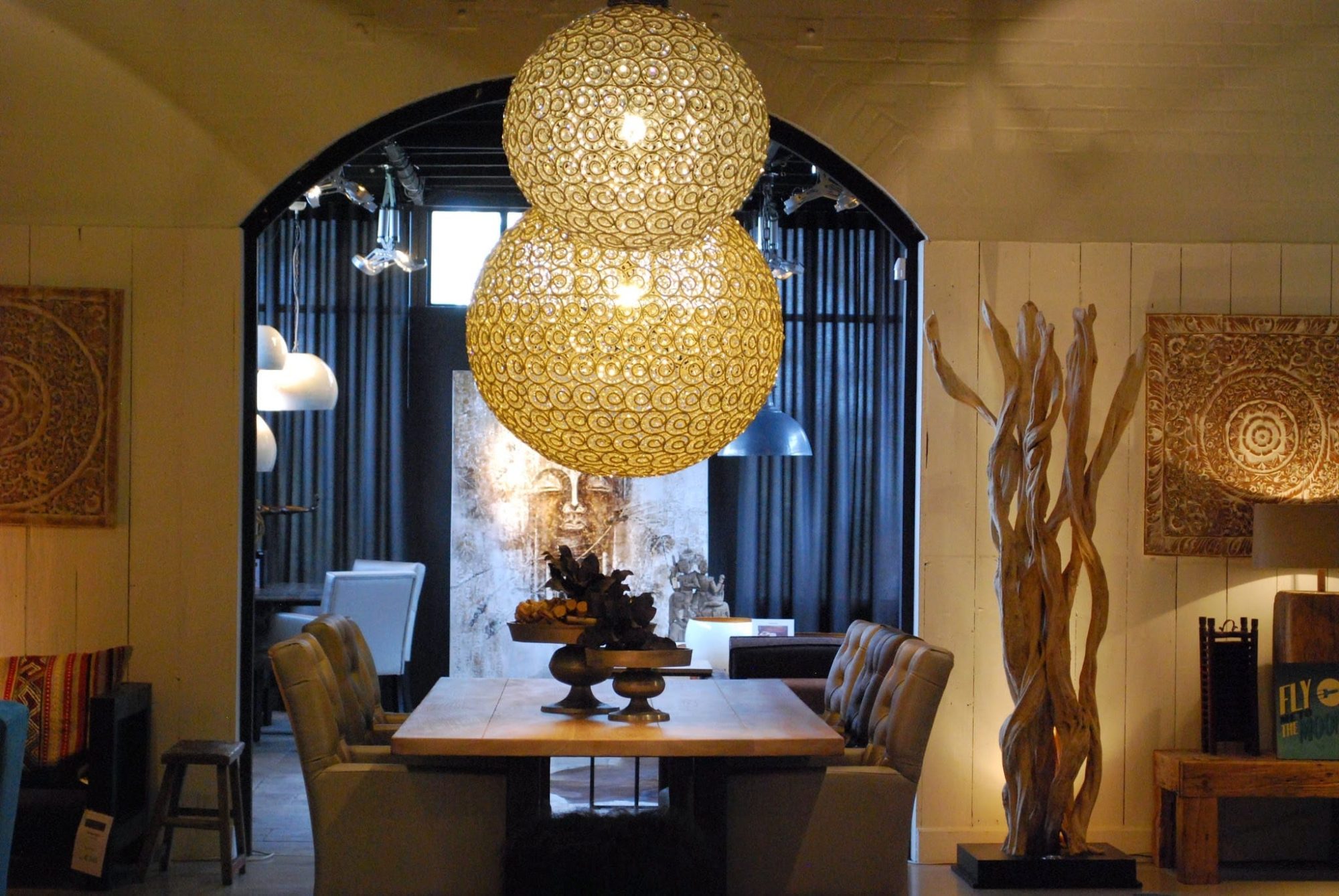 Super-Seat | Dining Room | Wooden table, upholstered chairs, XXL crystal chandelier. Warmth through bulb lighting and abstract art. | Hospitality Furniture