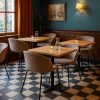 Super-Seat | Portland designer armchairs velour mocha in restaurant | Dark mocha velour chairs, wooden tables, glass details, black and white tiled floor. | Hospitality Furniture