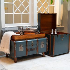Super-Seat | Blue wooden trunk tables with brown leather accents and metal details. | Hospitality Furniture