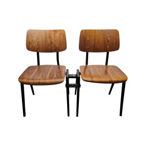 Super-Seat | Two brown/black chairs with black metal legs, connected, on white background. | Hospitality Furniture