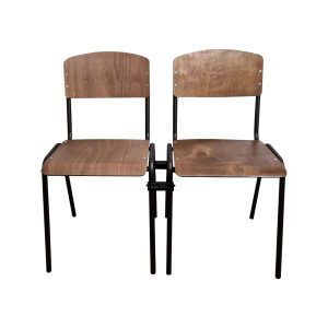 Super-Seat | Two light brown wooden chairs with black metal legs connected by black clutch, on white background. | Hospitality Furniture